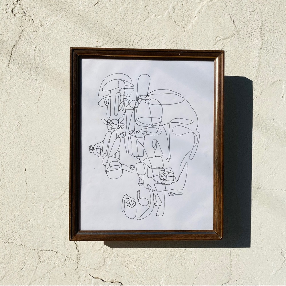 8.75” x 10.75” : 1/1 glass/wood framed drawing